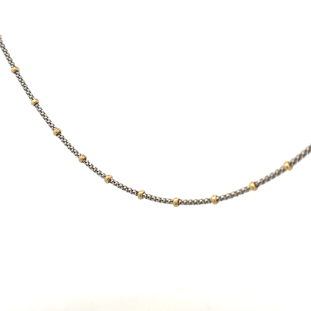 9ct gold chain weighing 5.6g, unbranded, with a classic link design, shown in a detailed product image.