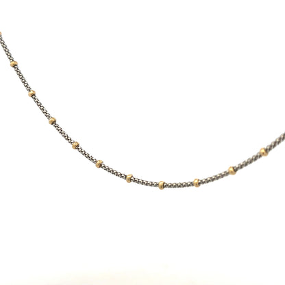 9ct gold chain weighing 5.6g, unbranded, with a classic link design, shown in a detailed product image.