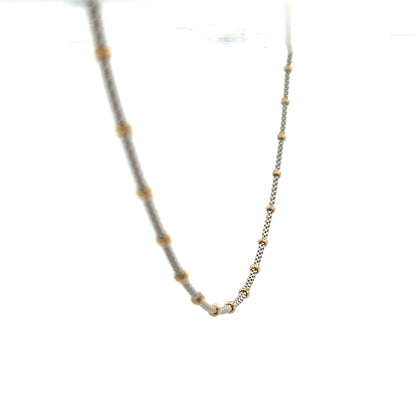 9ct gold chain weighing 5.6g, featuring a classic link design, unbranded jewelry accessory displayed on a plain background.