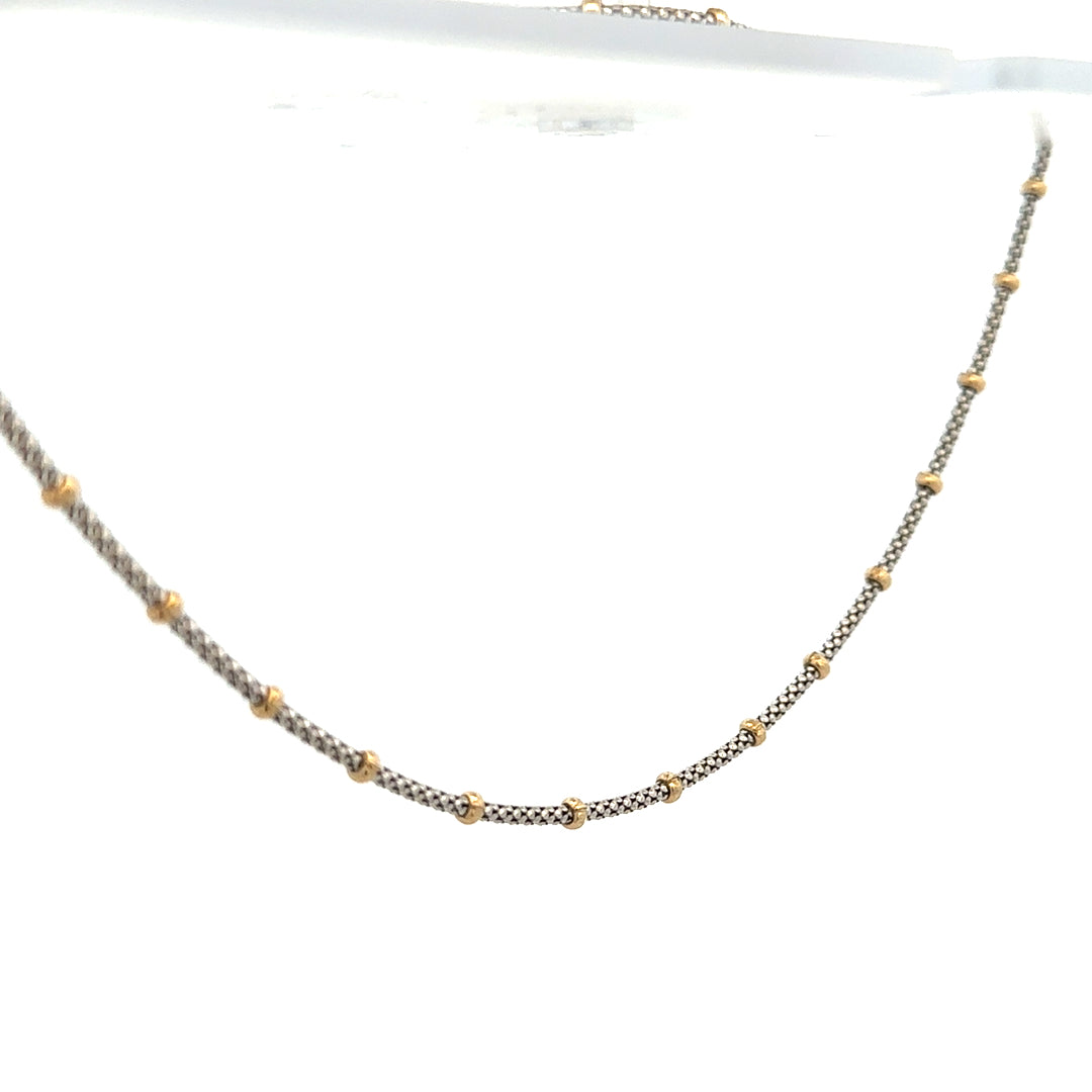 9ct gold chain weighing 5.6g, unbranded, featuring a classic link design, shown in a close-up image.