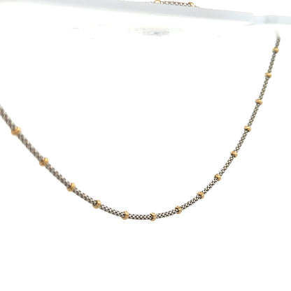 9ct gold chain weighing 5.6g, unbranded, featuring a classic link design, shown in a close-up image.