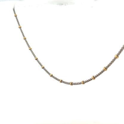 9ct gold chain weighing 5.6g, unbranded, with a classic design shown on a plain background.
