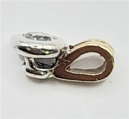 9ct gold diamond pendant with sparkling diamonds, weighs 0.7g, elegant jewelry piece featuring a classic design.