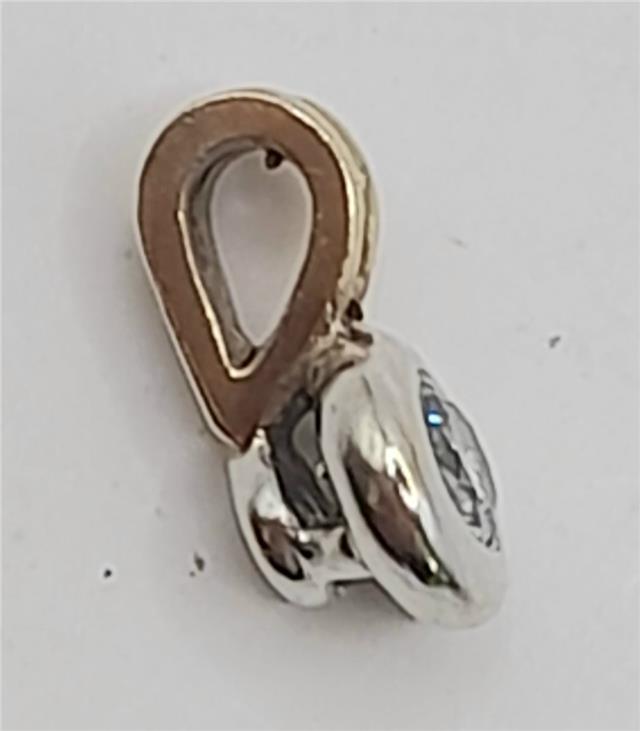 9ct gold diamond pendant, unbranded, featuring a sparkling diamond design, weighs 0.7g, elegant jewelry for special occasions.