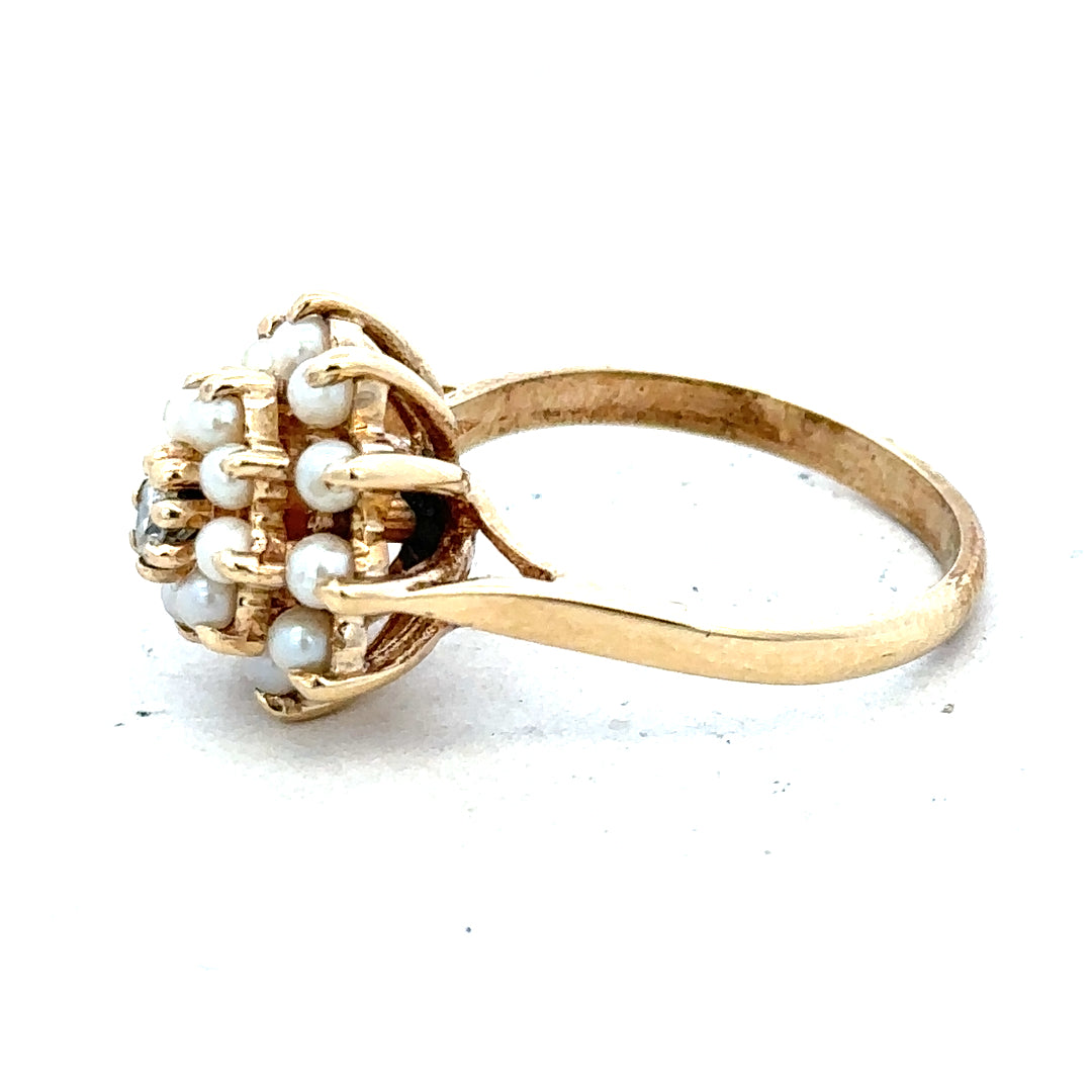9ct gold diamond ring featuring a sparkling central diamond and elegant band, showcasing fine craftsmanship and timeless design.