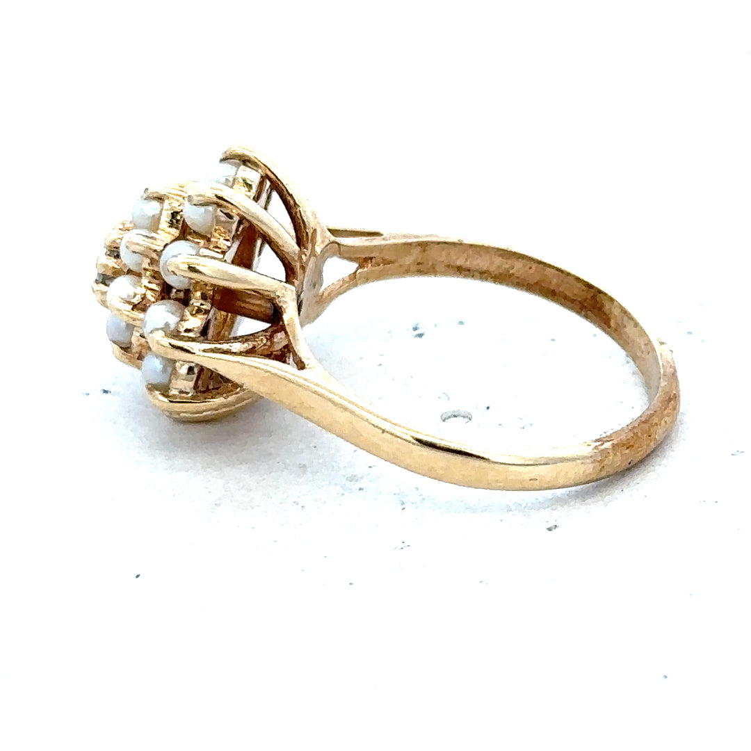 9ct gold diamond ring featuring a sparkling central diamond and a sleek band design.