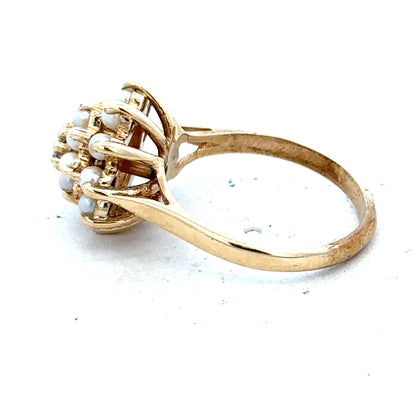 9ct gold diamond ring featuring a sparkling central diamond and a sleek band design.