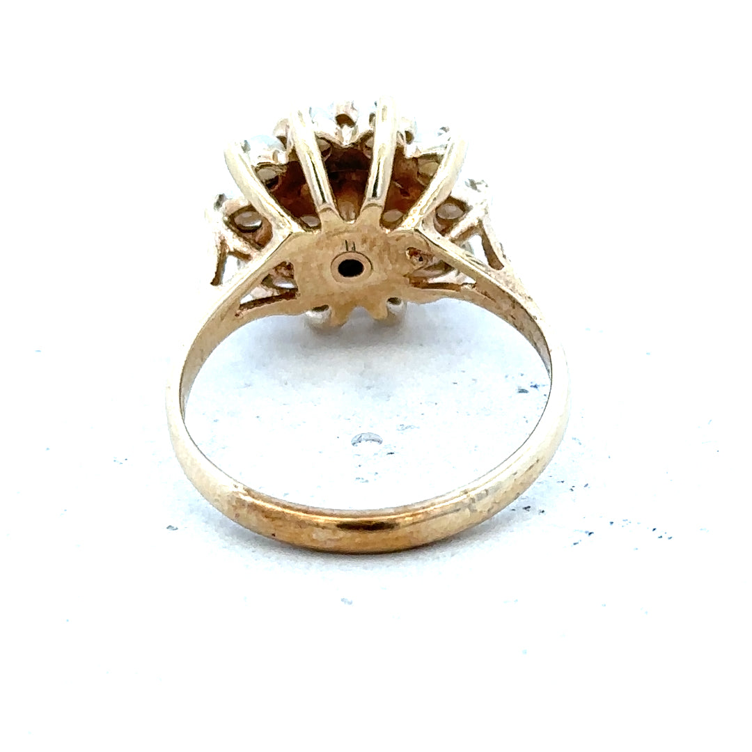 9ct gold diamond ring featuring a sparkling central diamond and polished gold band for elegant jewelry style