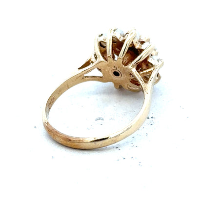 9ct gold diamond ring with a solitaire diamond and a polished band, showcasing elegant jewelry craftsmanship.