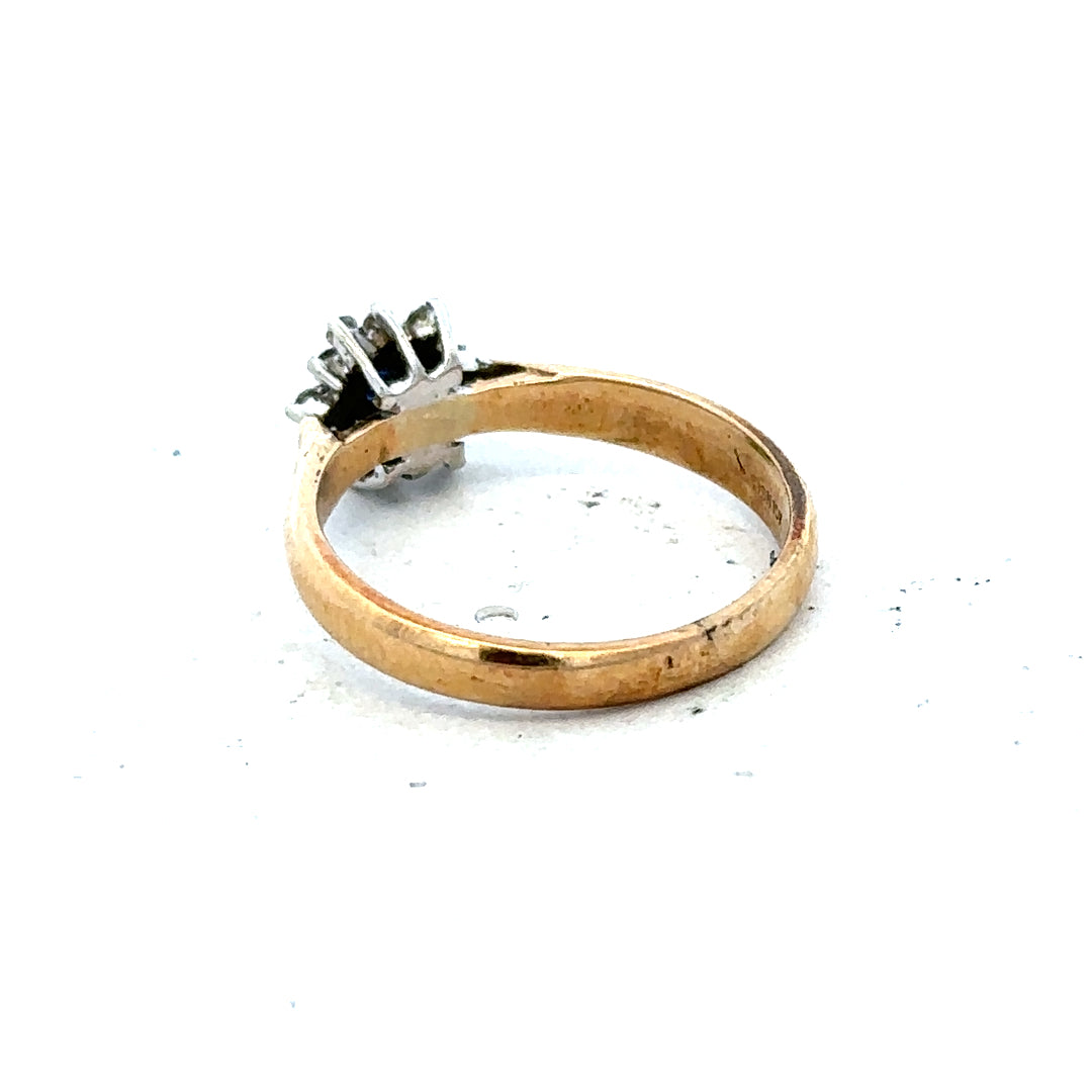 9ct gold diamond ring featuring a sparkling central diamond and elegant band, designed for a sophisticated look.