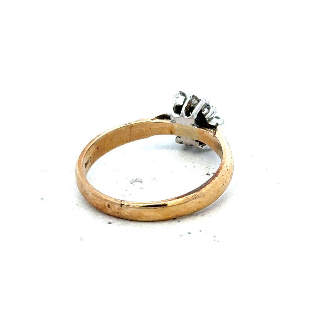 9ct gold diamond ring with a solitaire diamond setting, showcasing elegant craftsmanship and sparkling gemstone detail.