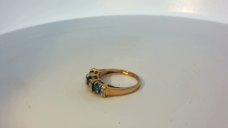 9ct gold ring in size L1/2 with a smooth band, unbranded jewelry, shown close-up against a neutral background.
