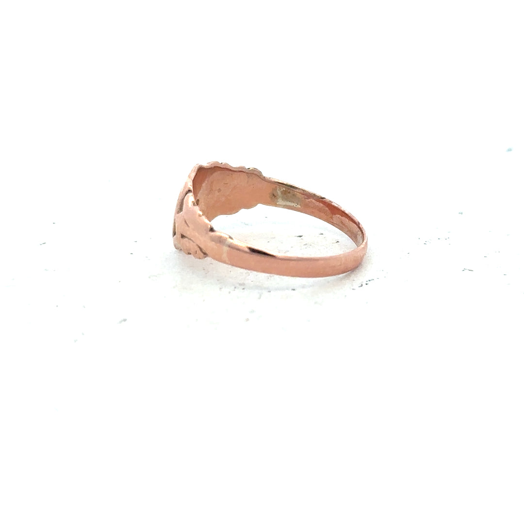 9ct gold ring in size O with a simple band design, unbranded, shown in a close-up view.