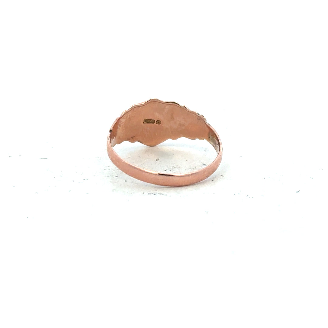 9ct gold ring in size O with a simple, polished band, unbranded jewelry showing a close-up of the gold ring.
