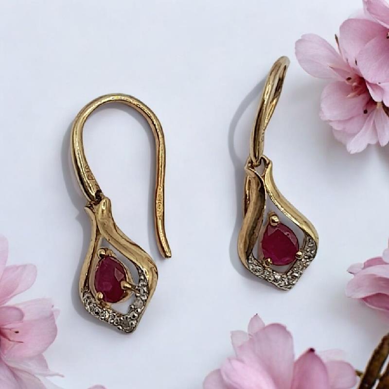 9ct gold Ruby earrings with central gemstones, elegant stud design, unbranded jewelry for sophisticated style.