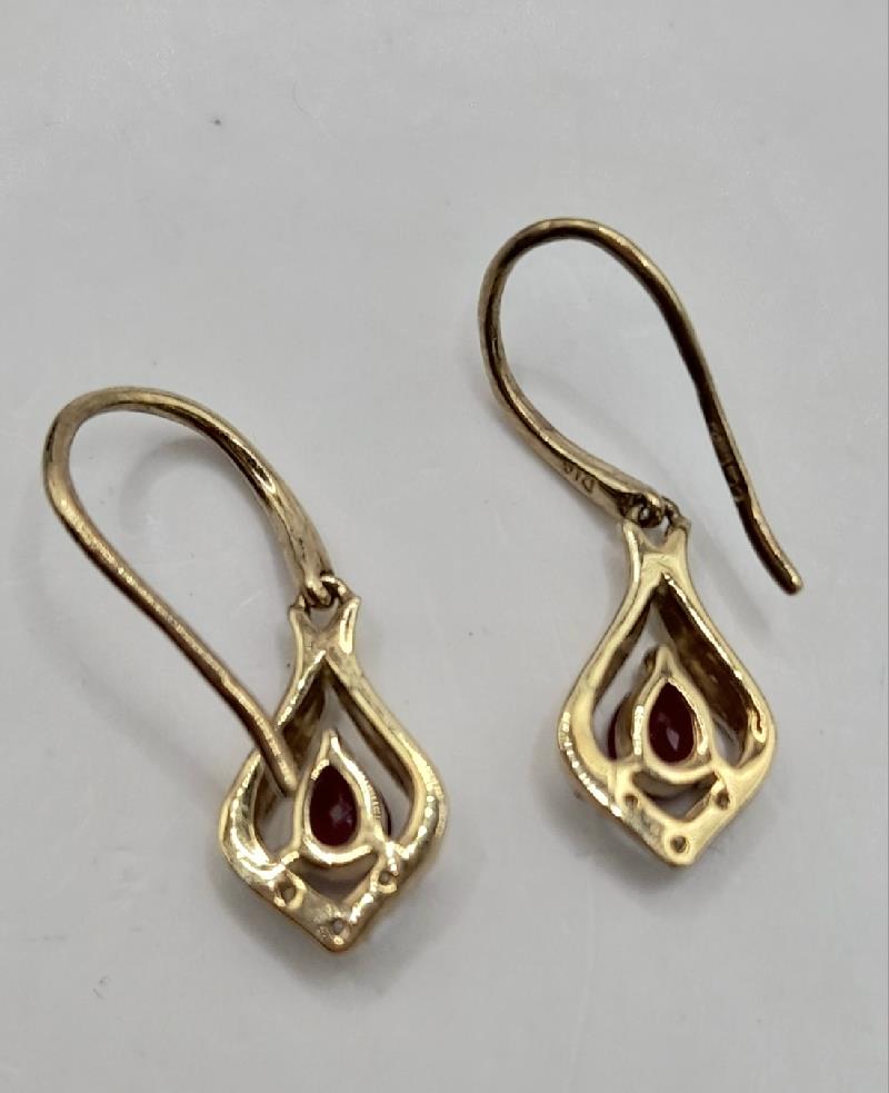 9ct gold Ruby earrings with round-cut red rubies set in classic gold settings, stylish and elegant jewelry for women.