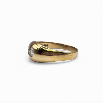 9ct yellow gold ring with a single diamond, showcasing a sleek and elegant design on a plain background.