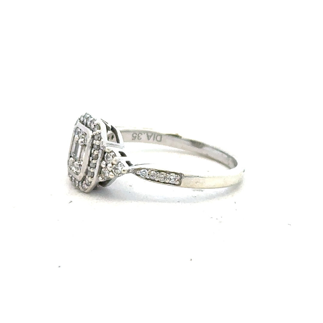 9ct white gold diamond ring with 0.35 carats, size J, featuring a sparkling central diamond and elegant band design.