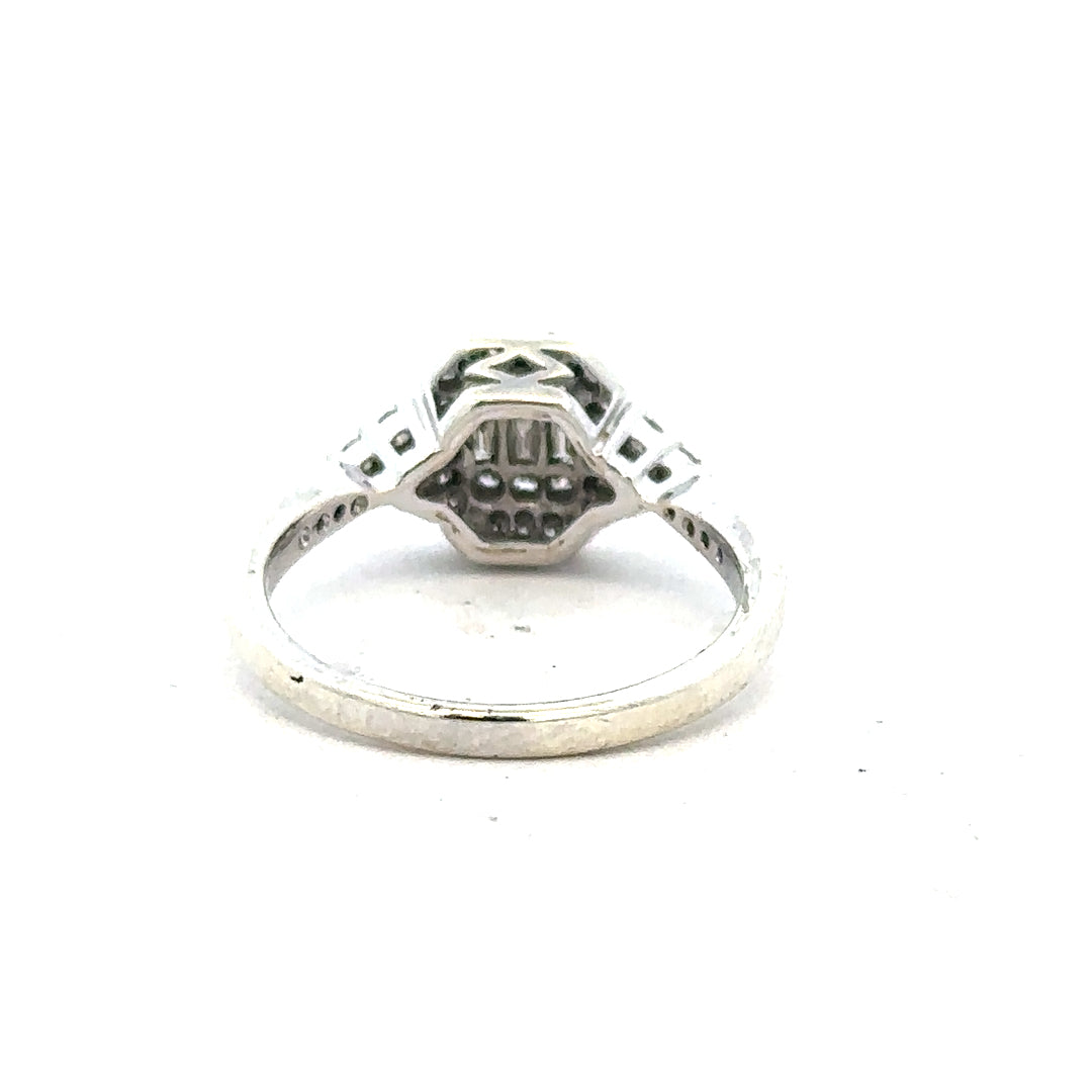 9ct white gold diamond ring with 0.35 carat center stone, size J, showcasing elegant design and sparkling diamonds.