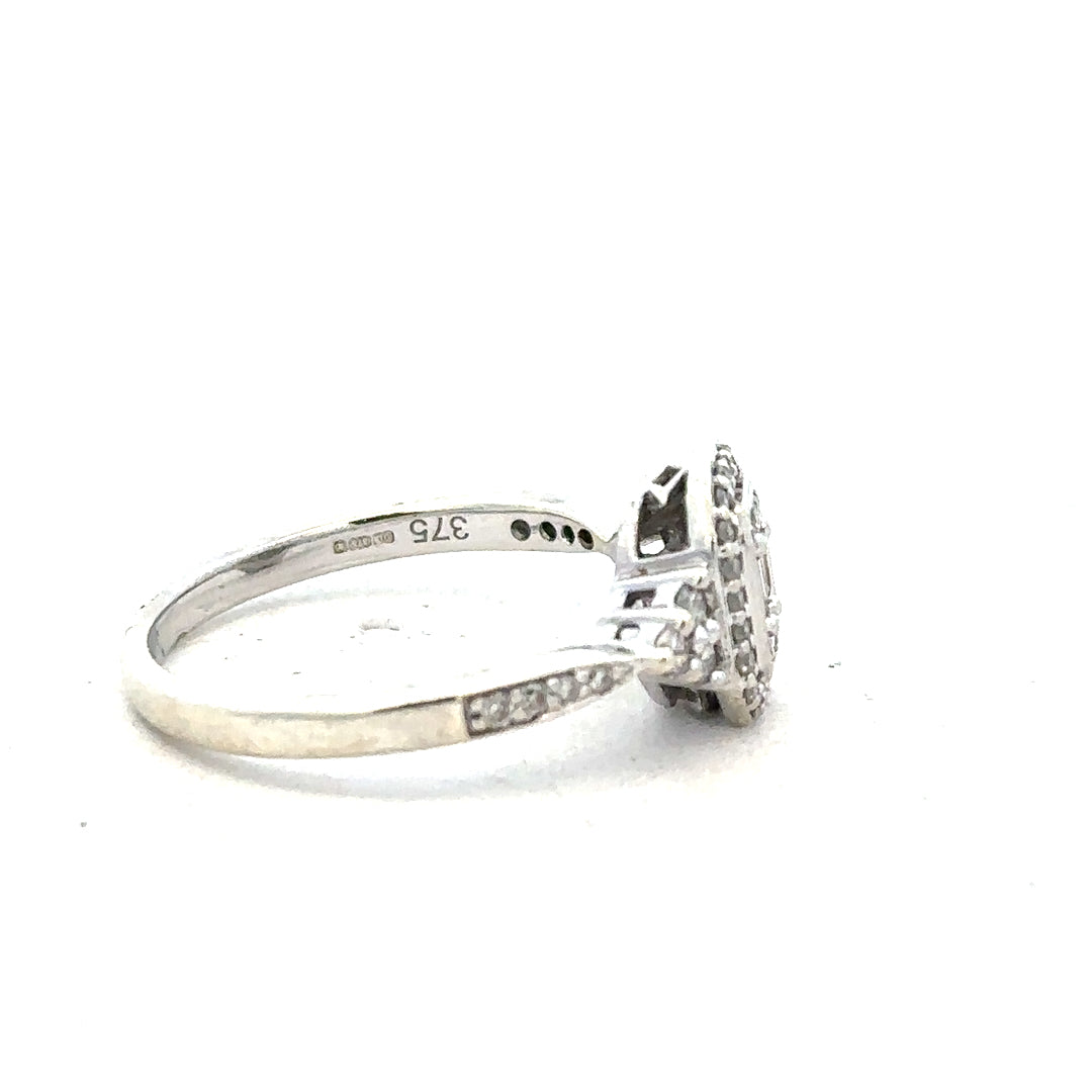 9ct white gold diamond ring with 0.35 carats, size J, featuring a sparkling central diamond and elegant band design.