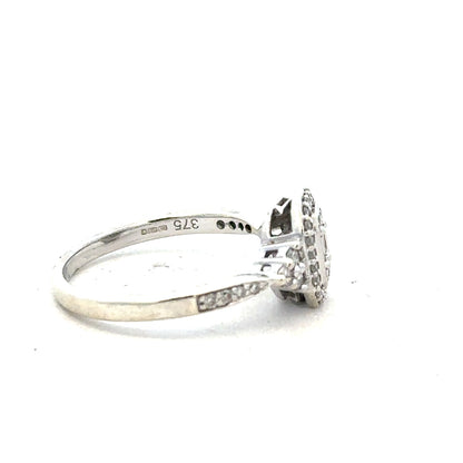 9ct white gold diamond ring with 0.35 carats, size J, featuring a sparkling central diamond and elegant band design.