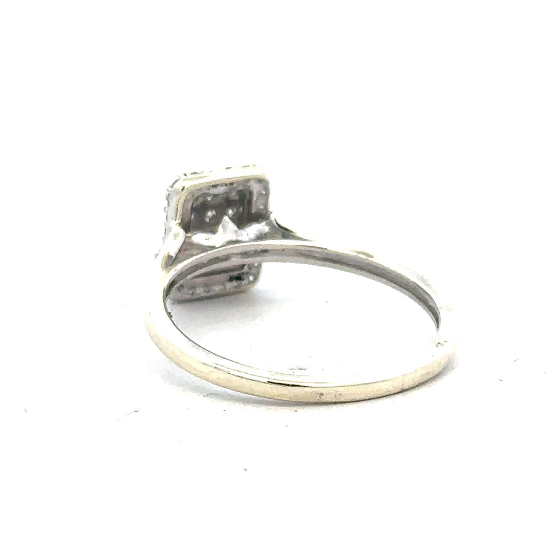 9ct white gold diamond ring with 0.36 carats, size S, featuring a sparkling central diamond and a sleek band design.