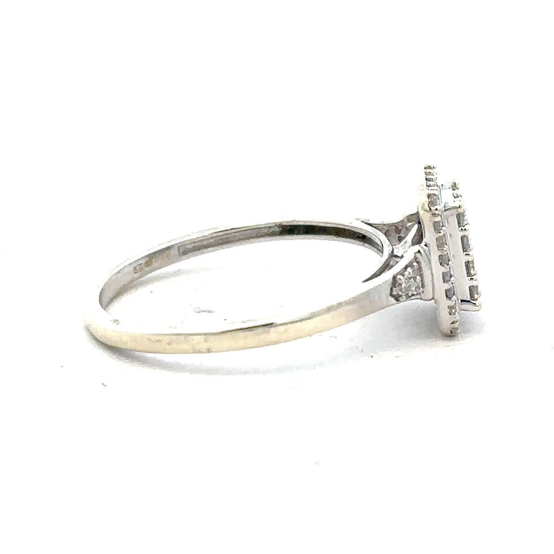 9ct white gold diamond ring with 0.36 carats, size S, featuring a sparkling diamond centerpiece.