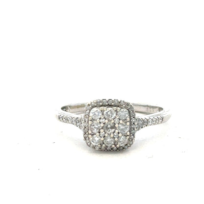9ct white gold diamond ring with 0.40 carats, size P, featuring a sparkling central diamond and a sleek band design.