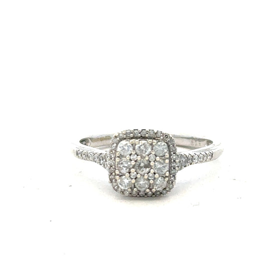 9ct white gold diamond ring with 0.40 carats, size P, featuring a sparkling central diamond and a sleek band design.