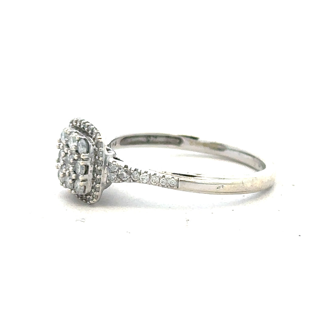 9ct white gold diamond ring with 0.40 carats, size P, featuring sparkling diamonds on a sleek band.