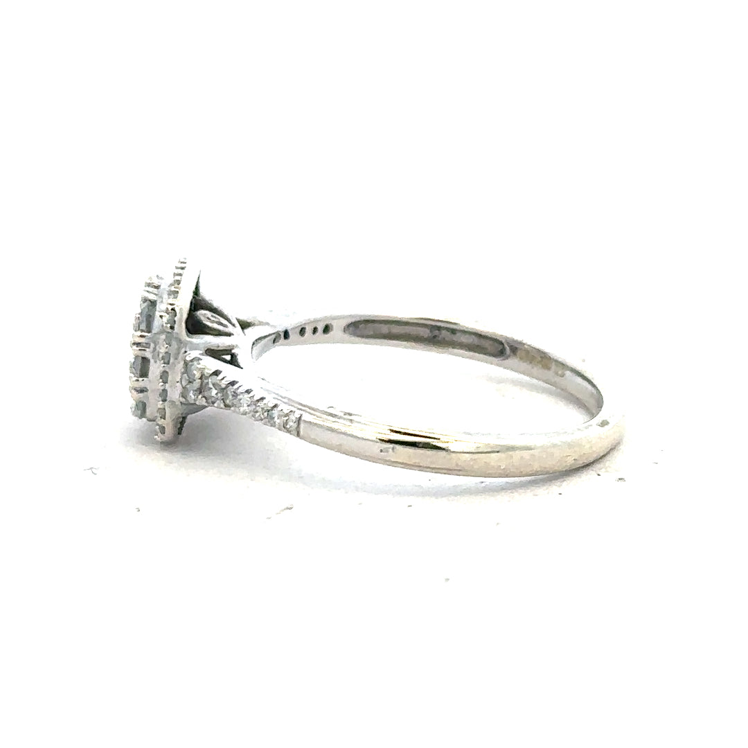 9ct white gold diamond ring with 0.40 carats, size P, featuring a sparkling central diamond and elegant band design.