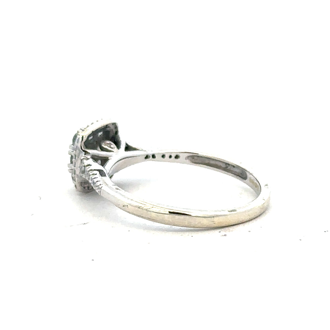 9ct white gold diamond ring with 0.40 carats, size P, featuring a sparkling central diamond and elegant band.