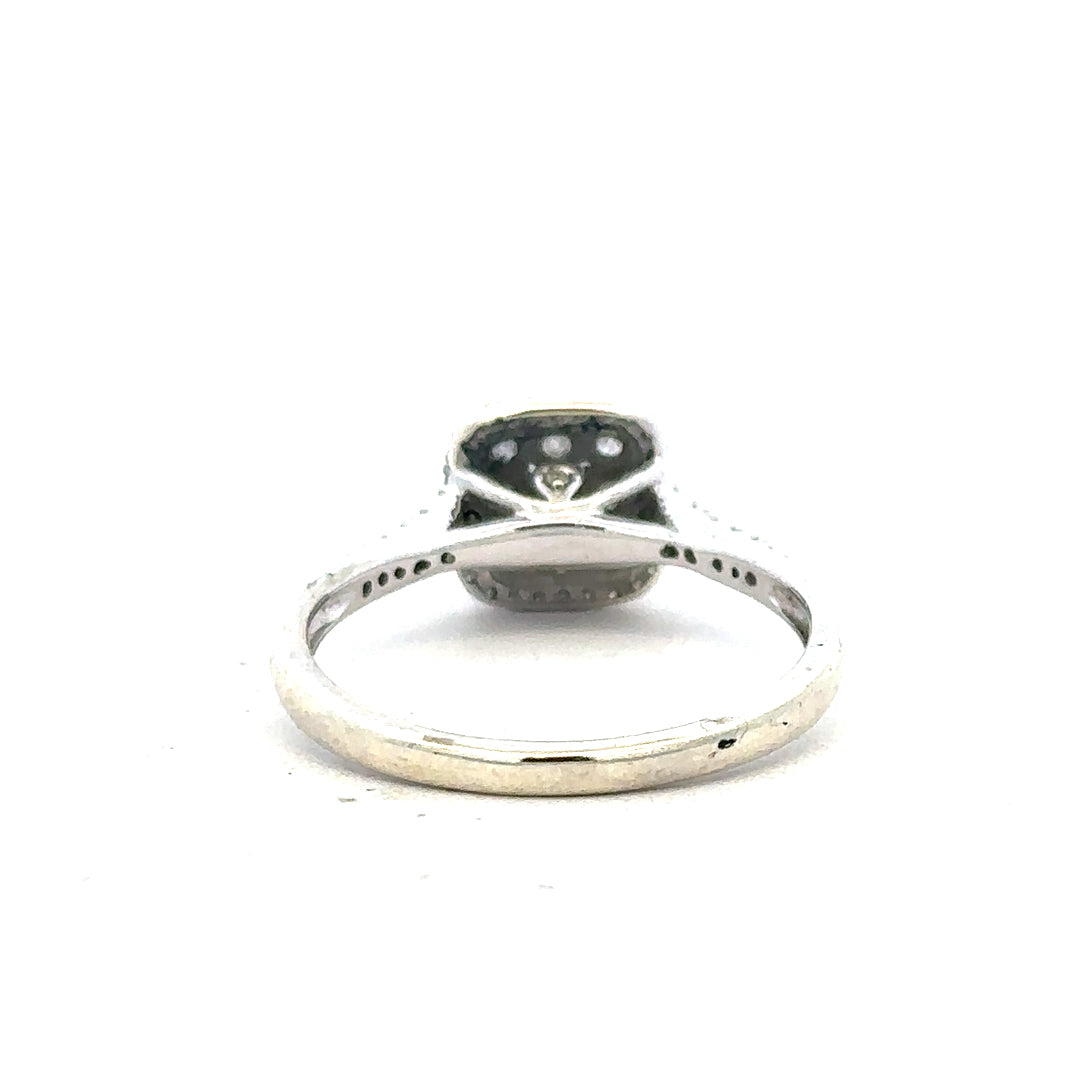 9ct white gold diamond ring with 0.40 carats, size P, featuring a sparkling central diamond and elegant band design.