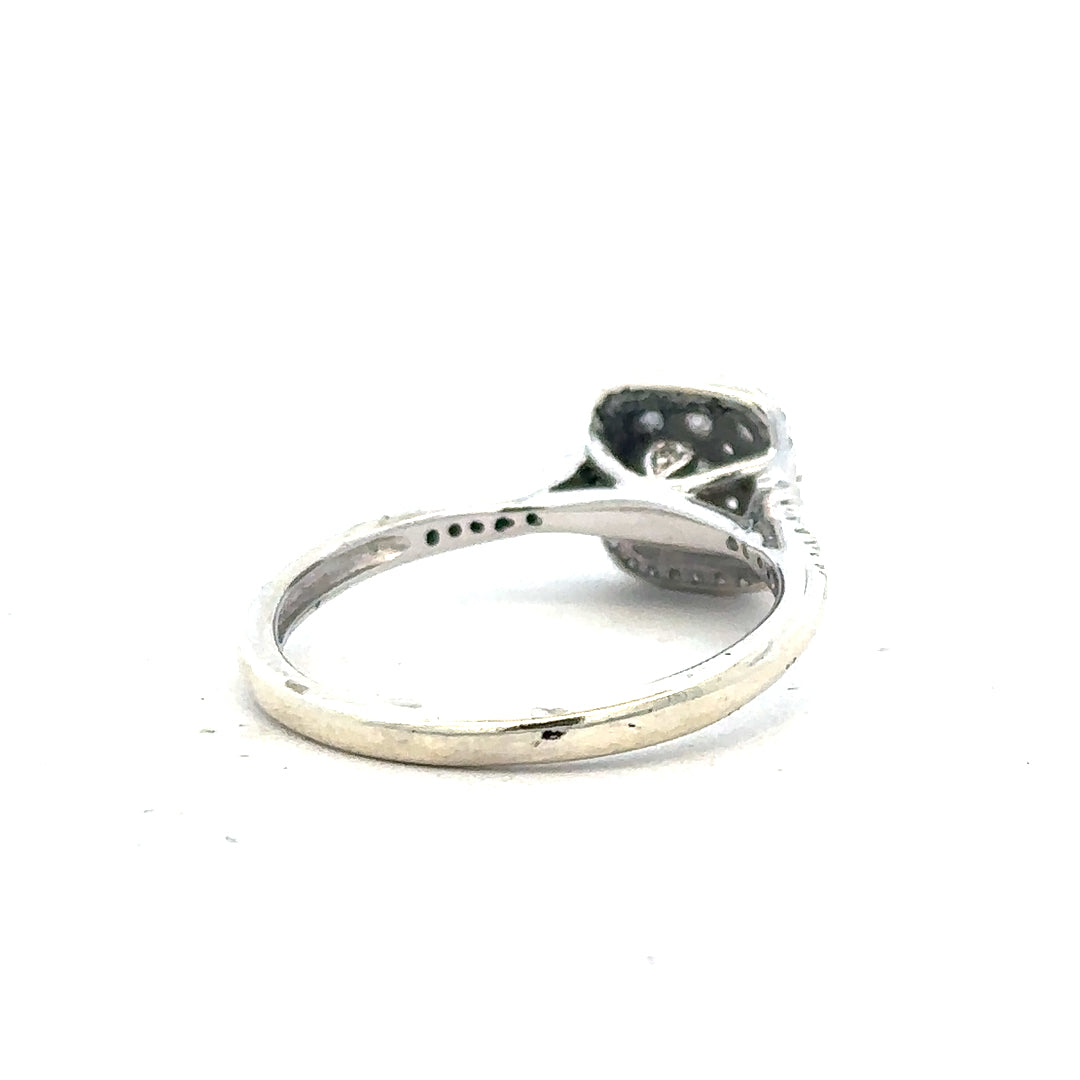 9ct white gold diamond ring with 0.40 carats, size P, featuring a sparkling diamond centerpiece on a sleek band.
