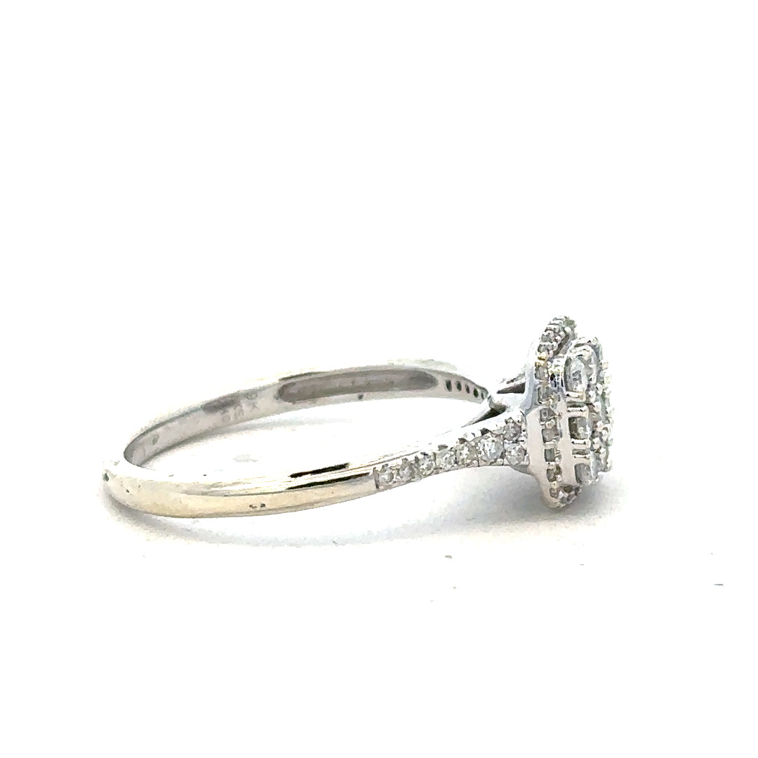9ct white gold diamond ring with 0.40 carats, size P, featuring a sparkling central diamond and a sleek band.