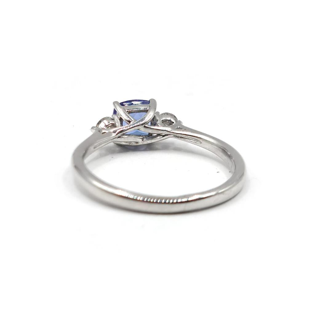 9ct white gold tanzanite and diamond ring with a 0.70 carat central gemstone, featuring a elegant and detailed design.