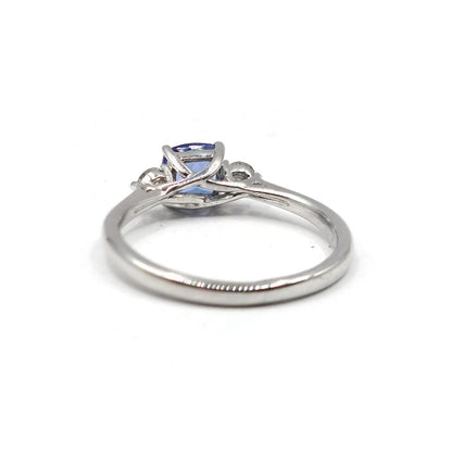 9ct white gold tanzanite and diamond ring with a 0.70 carat central gemstone, featuring a elegant and detailed design.