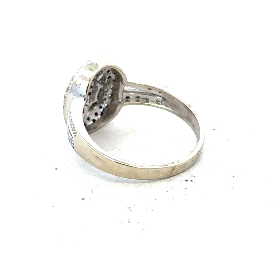 9ct white gold diamond ring with 1/2 carat solitaire, size P, featuring a sparkling central diamond.