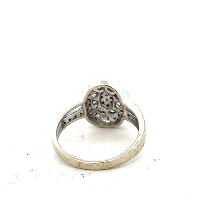 9ct white gold diamond ring with 1/2 carat center stone in size P on a white background