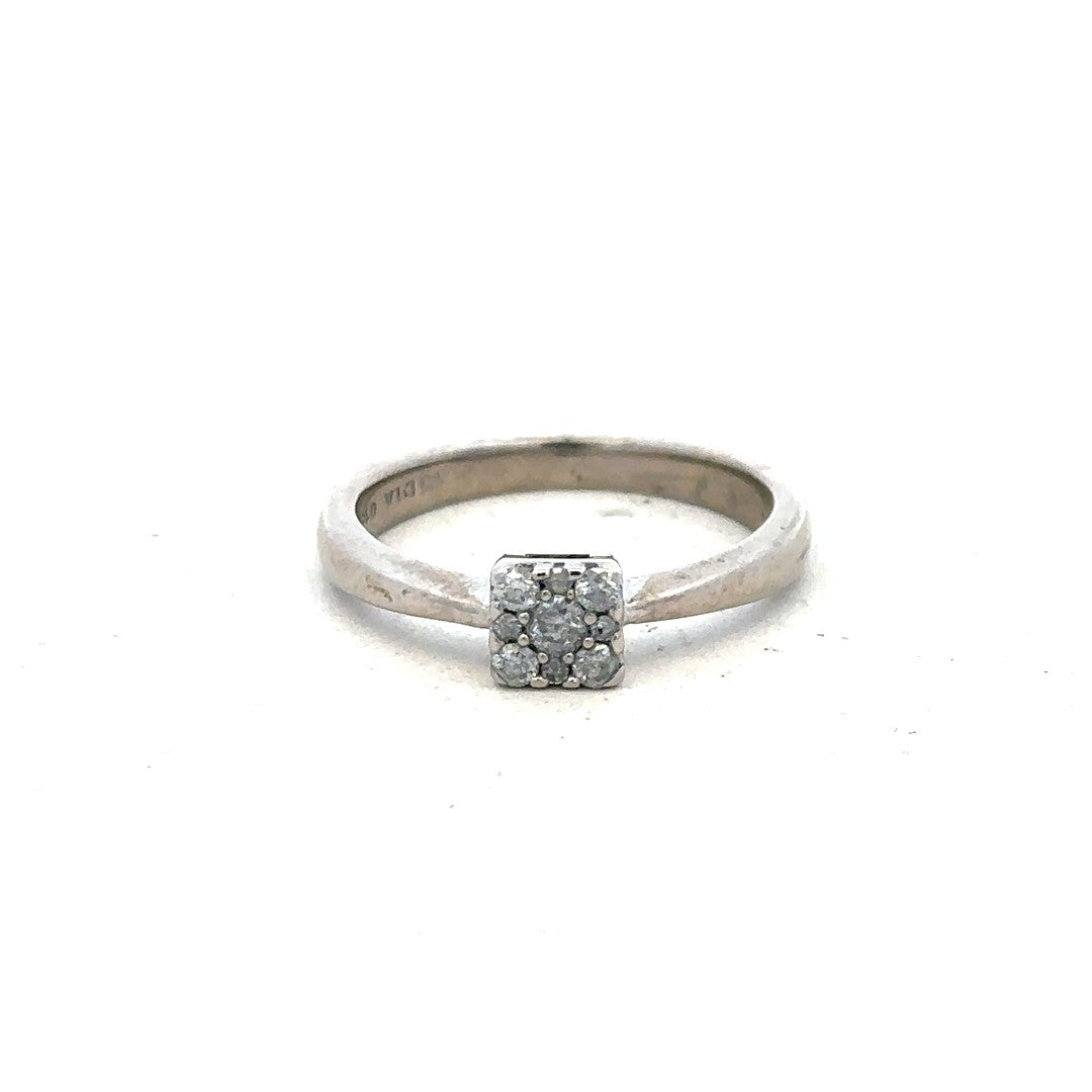 9ct white gold diamond ring with 15pts diamonds in size K½, showcasing a sleek, elegant design with sparkling gemstones.