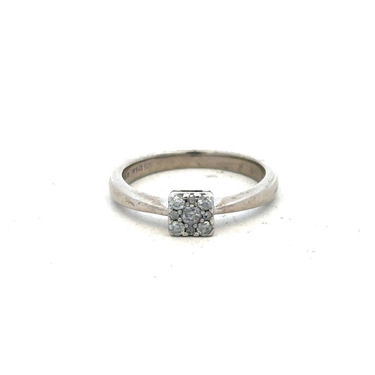 9ct white gold diamond ring with 15pts diamonds in size K½, showcasing a sleek, elegant design with sparkling gemstones.