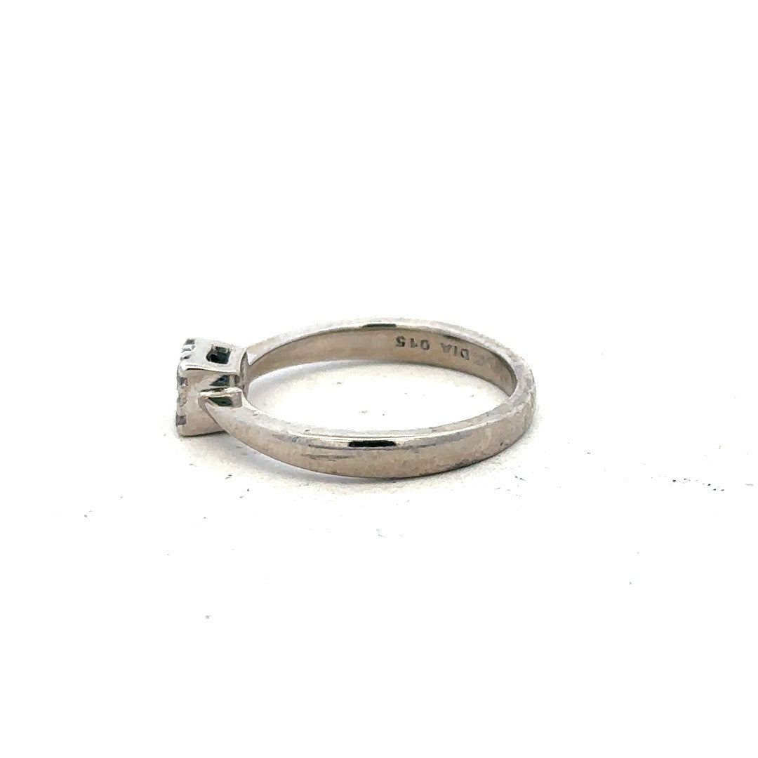 9ct white gold diamond ring with 15pts sparkle, size K1/2, featuring a sleek, elegant design with a secure band.