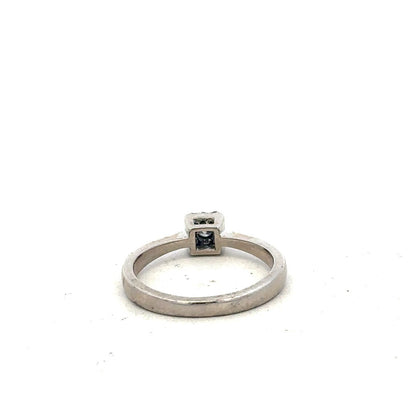 9ct white gold diamond ring with 15pts diamonds in size K1/2, featuring a sleek band and sparkling accents.