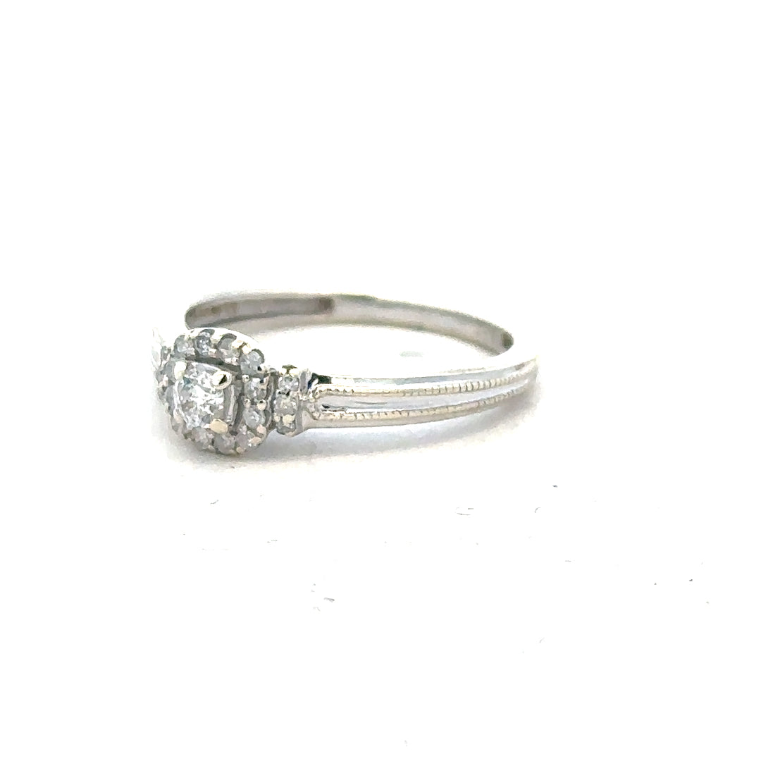 9ct white gold diamond ring with 20pts sparkling diamonds in size K1/2, elegant jewelry suitable for special occasions.