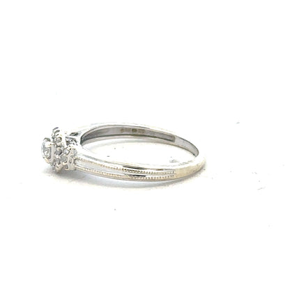 9ct white gold diamond ring with 20pts sparkling diamonds in size K1/2, showcasing elegant jewelry design.