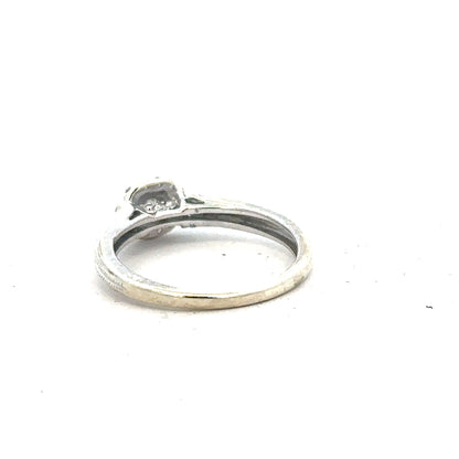 9ct white gold diamond ring with 20pts sparkling diamond, size K1/2, featuring a sleek and elegant design.