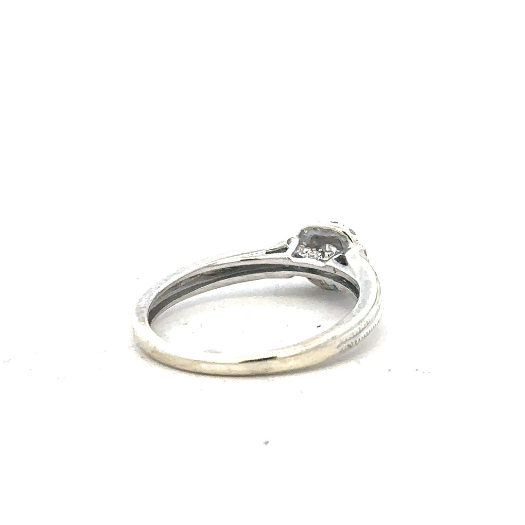 9ct white gold diamond ring with 20pts sparkling diamonds in size K 1/2, featuring a sleek and elegant design.