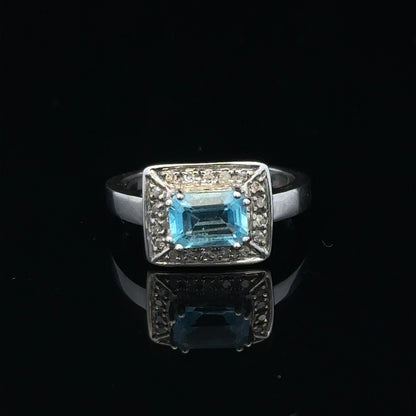 9ct white gold diamond ring in size L, featuring a sparkling central diamond and intricate band design.