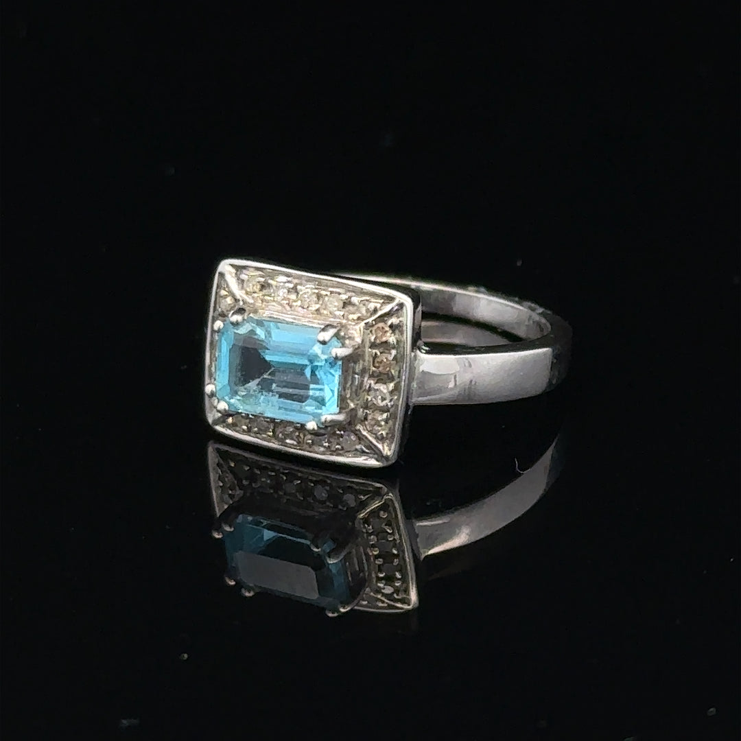 9ct white gold and diamond ring in size L, featuring a sleek design with sparkling diamonds and a polished band.
