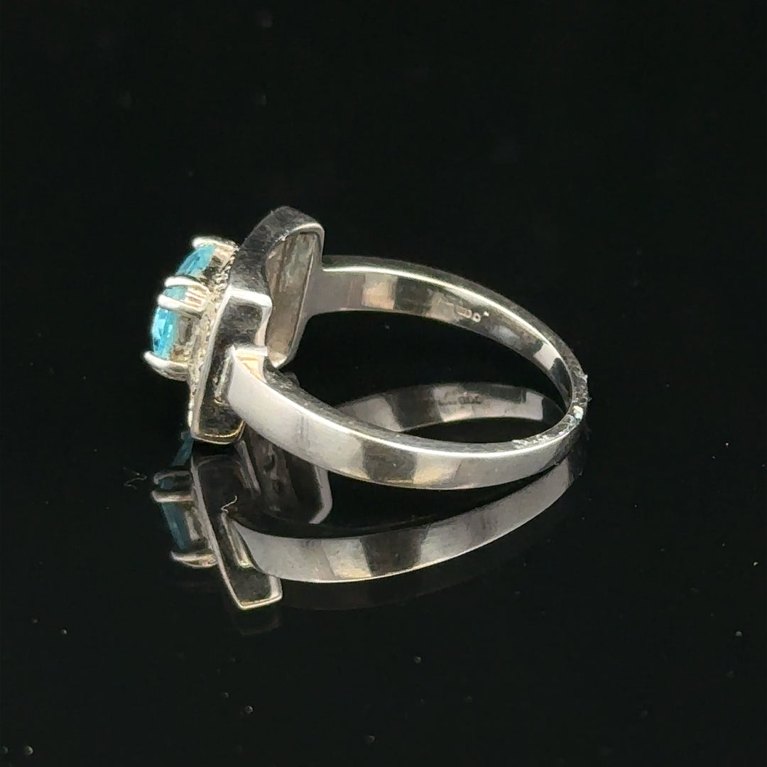 9ct white gold and diamond ring in size L with sparkling diamonds and a polished band, showcasing elegant jewelry craftsmanship